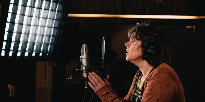 Image: Dr Sarah Jane Moore recording I know where the oysters lie. Photograph Anton Rehrl - Corvid Photography