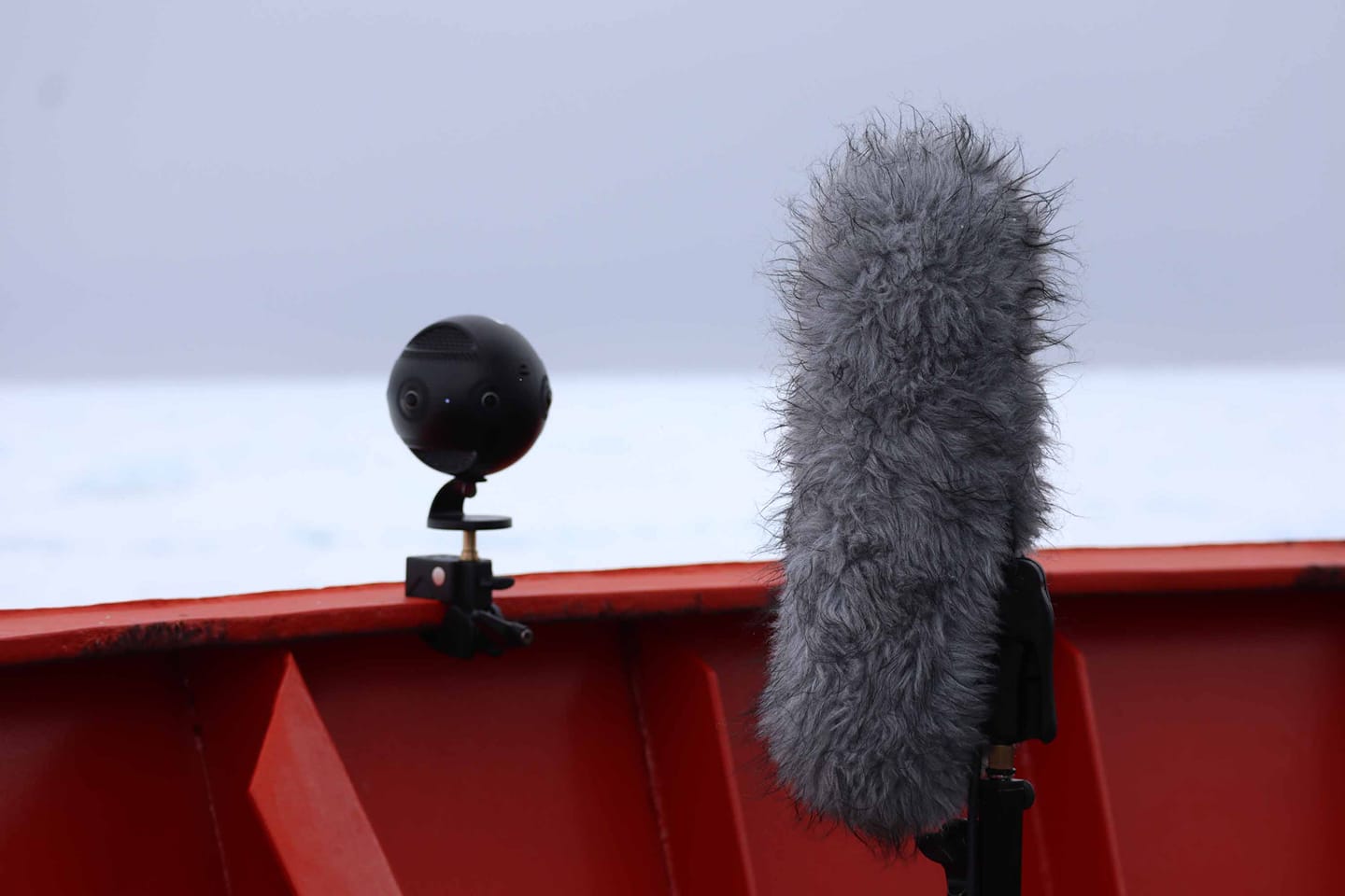 Recording the sea ice with the 360 camera and the ambisonic mic. Image courtesy Wild System, 2019-20 Australian Antarctic Arts Fellows Adam Nash and John McCormick.