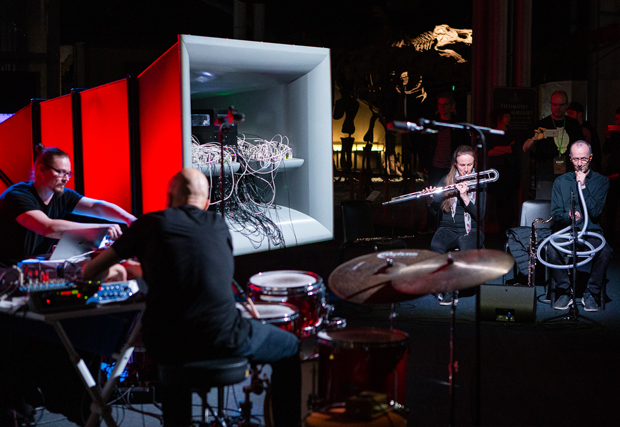 cellF, a surrogate performer, performing in Science Centre Heureka with Defunensemble, Helsinki, 2019