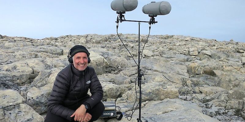 Australian Antarctic Arts Fellow, sound artist Philip Samartzis recording sounds in the field near Casey station. Photo: Philip Samartzis