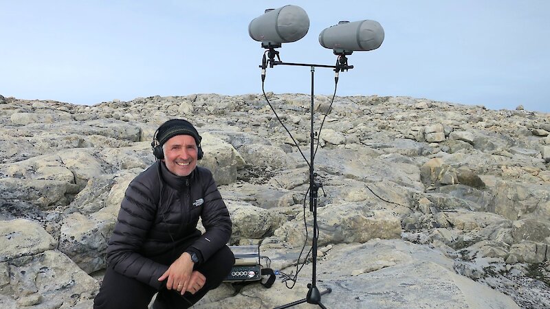 Australian Antarctic Arts Fellow, sound artist Philip Samartzis recording sounds in the field near Casey station. Photo: Philip Samartzis
