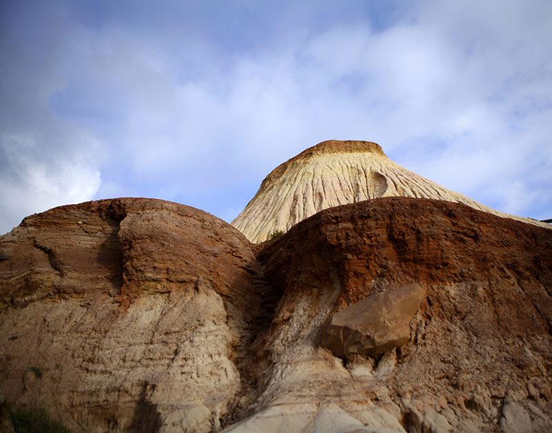 Hallet Cove, 'Sugarloaf' is a cone-shaped mountain made up of sediments deposited in a lake of melted ice around 280 million years ago. 